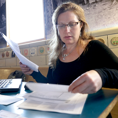 A business owner going over tax documents