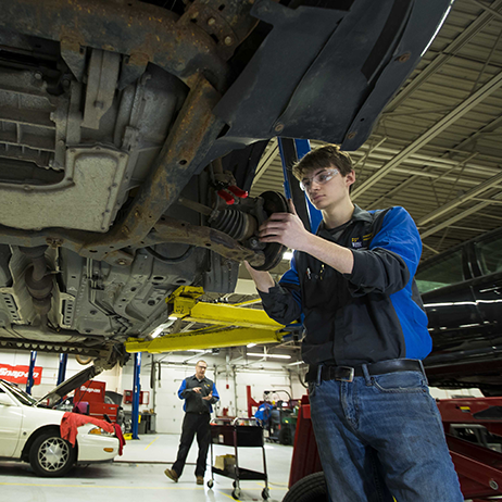 Automotive student working the campus lab