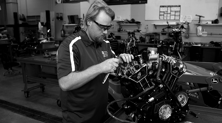 A student working on an engine