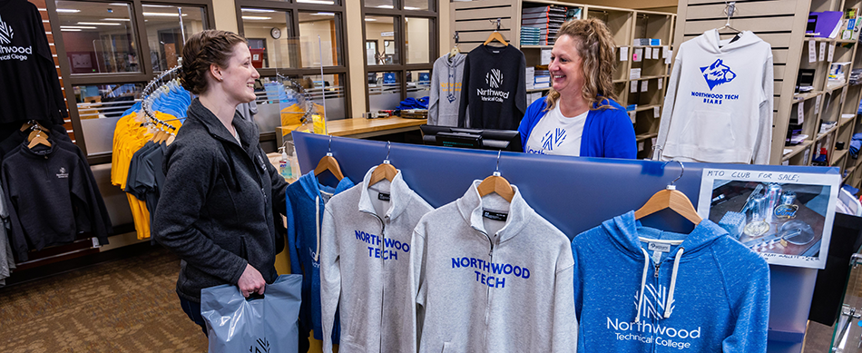 Student purchasing items from bookstore