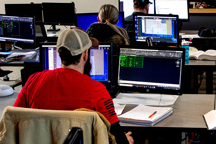 A Drafting Student utilizing industry-relevant software in the classroom
