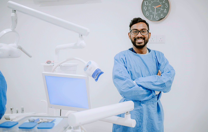 male dentist in dental clinic