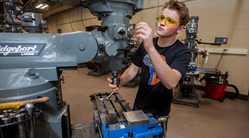 Student using equipment in Northwood Tech's state-of-the-art facilities