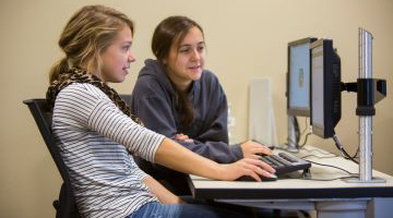 Two students on the computer
