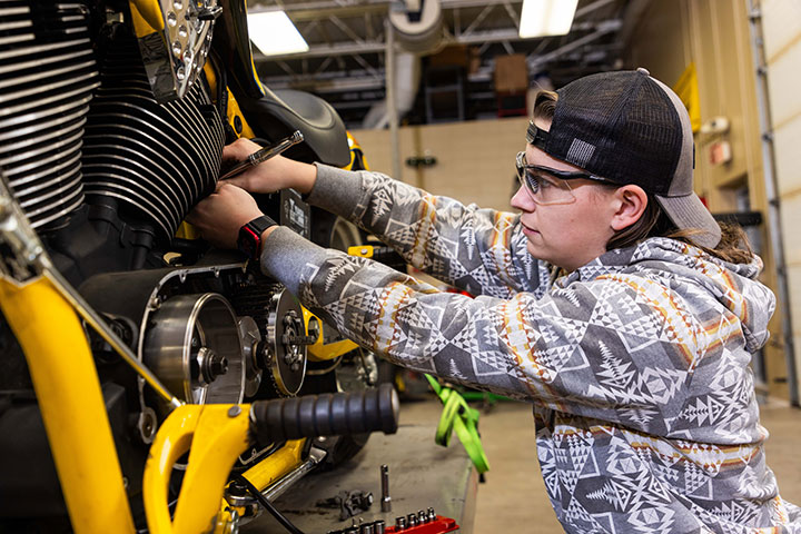 Northwood Tech student working on a motorcycle in the lab